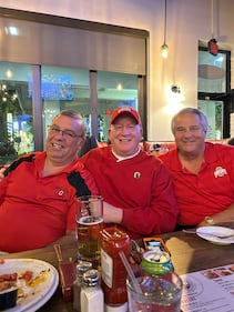 Vickie sent us this photo of her friends cheering all the way from Naples, Florida